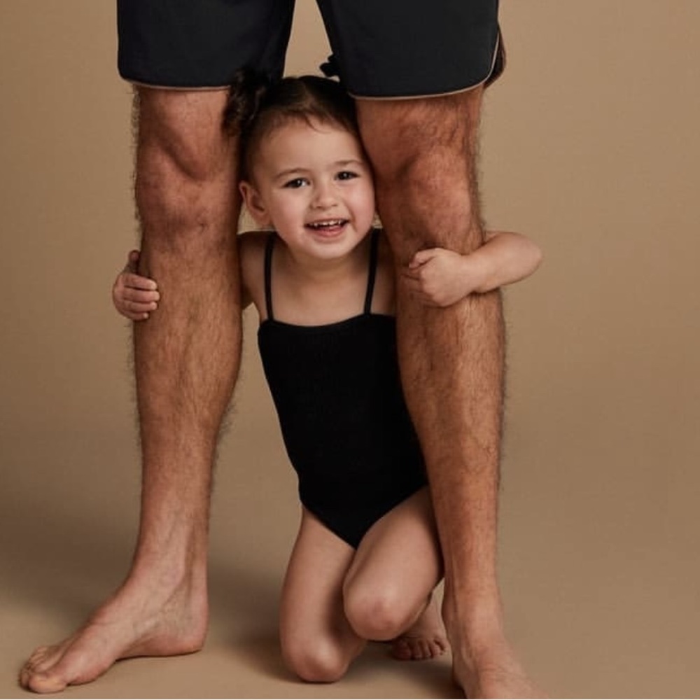 black ribbed one piece with snaps